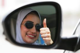 Zuhoor Assiri gestures as she drives her car in Dhahran, Saudi Arabia, June 24, 2018. REUTERS/Hamad I Mohammed