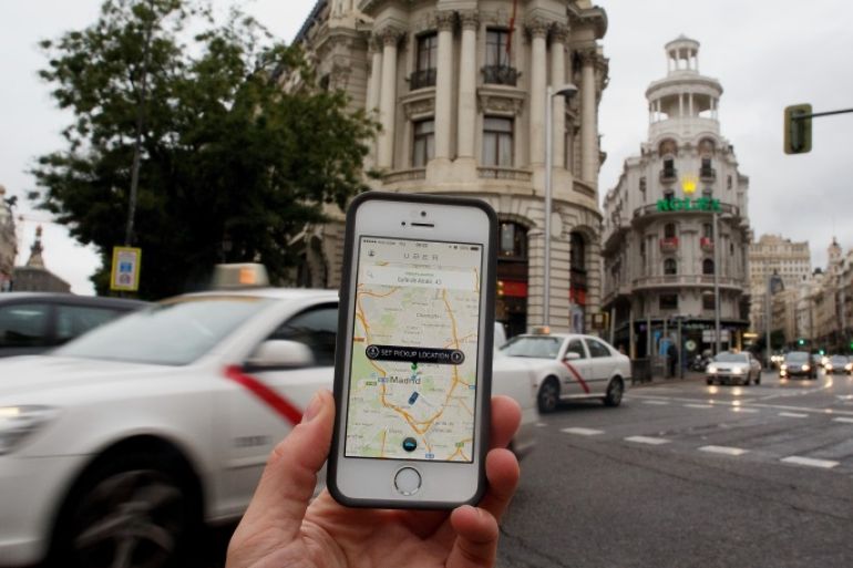 MADRID, SPAIN - OCTOBER 14: In this photo illustration the new smart phone taxi app 'Uber' shows how to select a pick up location at Alcala Street on October 14, 2014 in Madrid, Spain. 'Uber' application started to operate in Madrid last September despite Taxi drivers claim it is an illegal activity and its drivers currently operate without a license. 'Uber' is an American based company which is quickly expanding to some of the main cities from around the world. (Photo by Pablo Blazquez Dominguez/Getty Images)