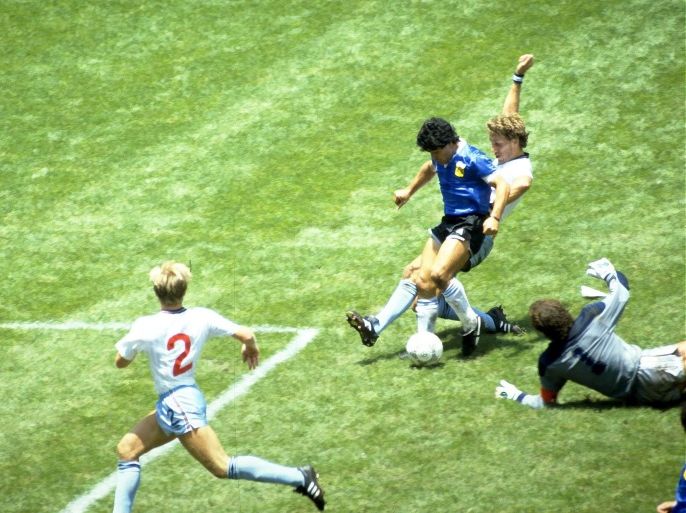 Football - 1986 FIFA World Cup - Quarter Final - England v Argentina - Azteca Stadium, Mexico City - 22/6/86 Diego Maradona scores for Argentina. Mandatory Credit: Action Images / Juha Tamminen