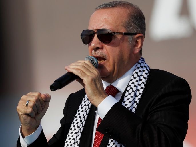 Turkish President Tayyip Erdogan delivers a speech during a protest against the recent killings of Palestinian protesters on the Gaza-Israel border and the U.S. embassy move to Jerusalem, in Istanbul, Turkey May 18, 2018. REUTERS/Murad Sezer