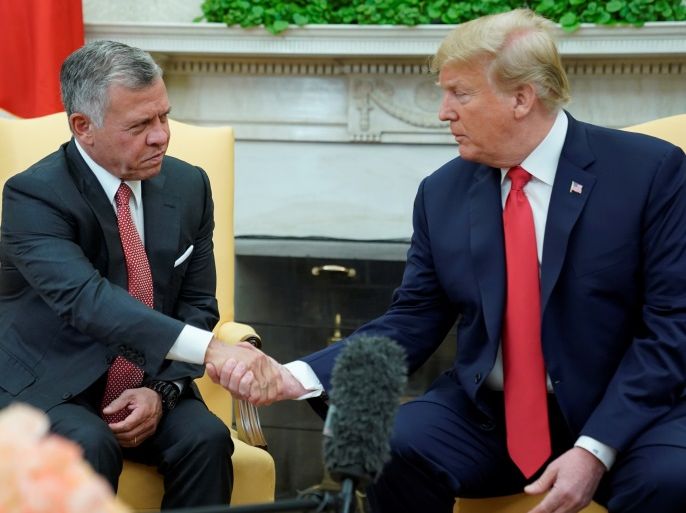 U.S. President Donald Trump shakes hands with Jordan’s King Abdullah as they meet in the Oval Office of the White House in Washington, U.S., June 25, 2018. REUTERS/Jonathan Ernst