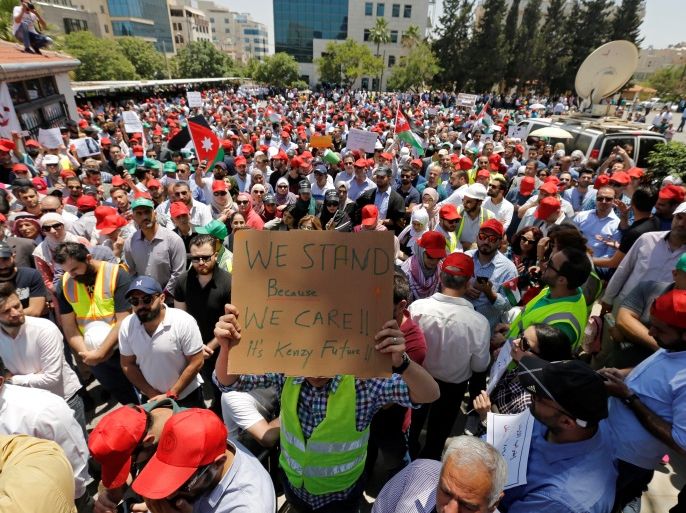 Protesters are seen gathered in front of the Labour Union offices in Amman, Jordan, June 6, 2018. REUTERS/Muhammad Hamed