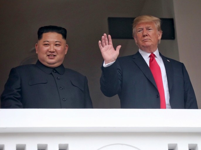 SINGAPORE, SINGAPORE - JUNE 12: n this handout photograph provided by The Strait Times, North Korean leader Kim Jong-un (L) with U.S. President Donald Trump (R) during their historic U.S.-DPRK summit at the Capella Hotel on Sentosa island on June 12, 2018 in Singapore. U.S. President Trump and North Korean leader Kim Jong-un held the historic meeting between leaders of both countries on Tuesday morning in Singapore, carrying hopes to end decades of hostility and the thr