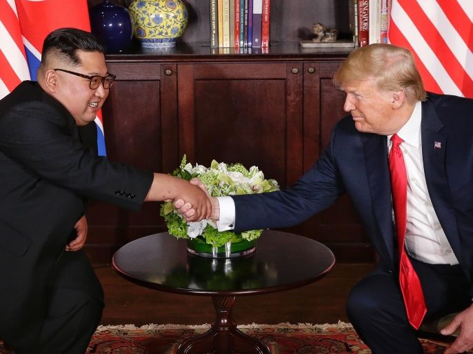 2 من لقاء الرئيس الأميركي دونالد ترامب والزعيم الكوري الشمالي كيم جونغ أون في سنغافورة يوم 12 يونيو/حزيران 2018