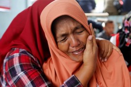 Lela Supiyanti, cries for her daughter, a passenger on the KM Sinar Bangun ferry which sank yesterday in Lake Toba, at Tigaras port in Simalungun, North Sumatra, Indonesia June 19, 2018. REUTERS/Beawiharta