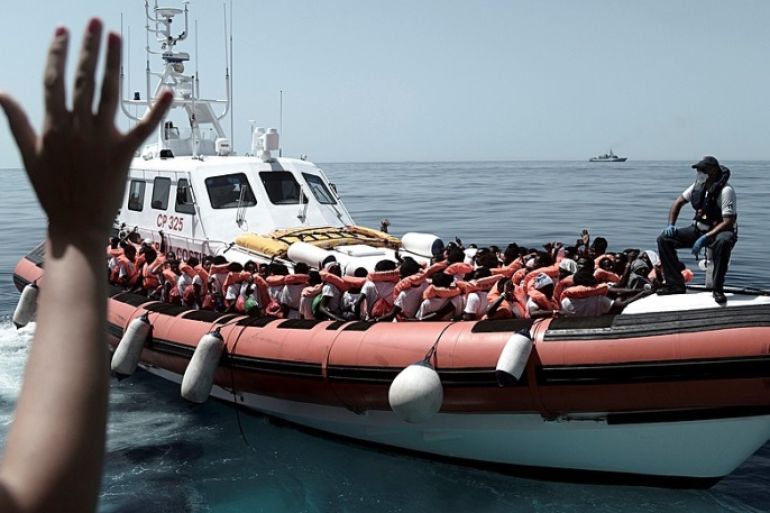 Migrants are seen after being rescued by MV Aquarius, a search and rescue ship run in partnership between SOS Mediterranee and Medecins Sans Frontieres in the central Mediterranean Sea, June 12, 2018. Karpov / SOS Mediterranee/Handout via REUTERS ATTENTION EDITORS - THIS IMAGE WAS PROVIDED BY A THIRD PARTY.