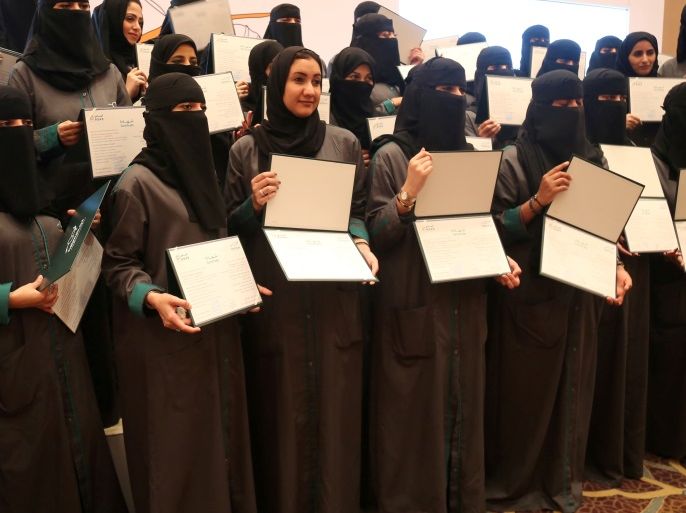 Saudi women hold their diplomas during the graduation ceremony of Saudi women car-accident inspectors, a few days before women are set to take the wheel in Riyadh, Saudi Arabia June 21, 2018. Picture taken June 21, 2018. REUTERS/Noemie Olive