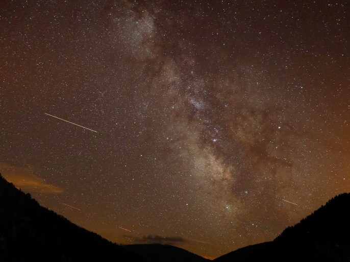 Milky Way is seen during the annual Perseid meteor shower above Salime Reservoir, near Grandas de Salime, Spain August 11, 2017. Picture taken August 11, 2017. REUTERS/Paul Hanna