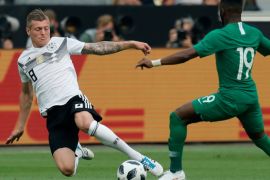 epa06794628 Germany's Toni Kroos (L) in action against Saudi Arabia's Fahad Almuwallad (R) during the international friendly soccer match between Germany and Saudi Arabia in Leverkusen, Germany, 08 June 2018. EPA-EFE/RONALD WITTEK