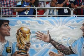 Soccer Football - World Cup - Group D - Argentina vs Iceland - Spartak Stadium, Moscow, Russia - June 16, 2018 Fans display a banner of Argentina's Lionel Messi and Diego Maradona before the match REUTERS/Carl Recine