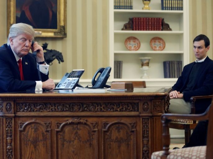 U.S. President Donald Trump, joined by his senior advisor and son-in-law Jared Kushner (R), speaks by phone with the Saudi Arabia's King Salman in the Oval Office at the White House in Washington, U.S. January 29, 2017. REUTERS/Jonathan Ernst