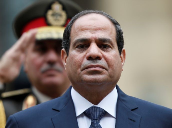 FILE PHOTO: Egyptian President Abdel Fattah al-Sisi attends a military ceremony in the courtyard of the Hotel des Invalides in Paris, France, November 26, 2014. To match Special Report EGYPT-MILITARY/ECONOMY REUTERS/Charles Platiau/File Photo