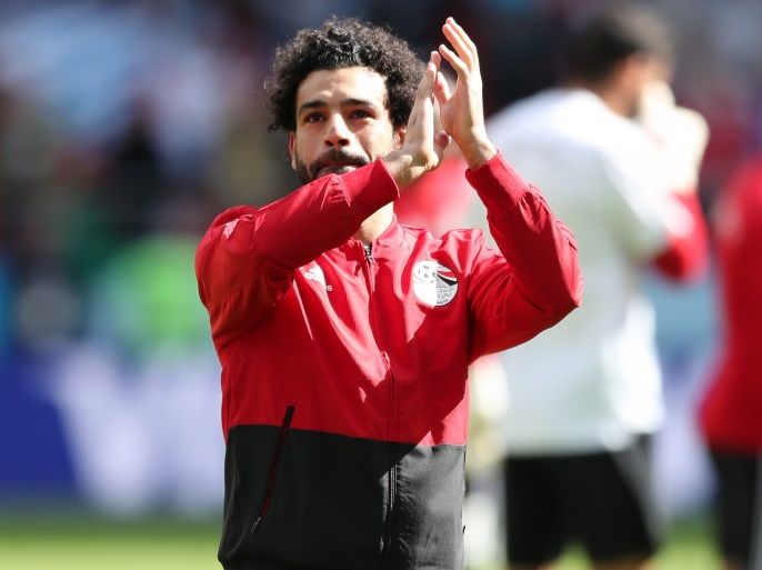 YEKATERINBURG, RUSSIA - JUNE 15: Mohamed Salah of Egypt waves to fans during warm up prior to the 2018 FIFA World Cup Russia group A match between Egypt and Uruguay at Ekaterinburg Arena on June 15, 2018 in Yekaterinburg, Russia. (Photo by Clive Rose/Getty Images)