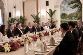 SINGAPORE, SINGAPORE - JUNE 11: In this handout provided by the Singapore's Ministry of Communications and Information (MCI) shows U.S. President Donald Trump (6th from Left), Michael Pompeo (5th from Right), John Bolton (4th from Right), Sarah Huckabee Sanders (3rd from Right), with Singapore's Prime Minister Lee Hsien Loong (R) on June 11, 2018 in Singapore, Singapore. The historic meeting between U.S. President Donald Trump and North Korean leader Kim Jong-un has been scheduled in Singapore for June 12 as the world awaits the landmark summit in the Southeast Asian city-state. (Photo by Singapore's Ministry of Communications and Information (MCI)/via Getty Images)