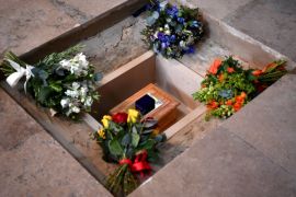 Flowers are placed alongside the ashes of British scientist Stephen Hawking at the site of interment in the nave of the Abbey church, during a memorial service at Westminster Abbey, in London, Britain, June 15, 2018. Ben Stansall/Pool via REUTERS TPX IMAGES OF THE DAY