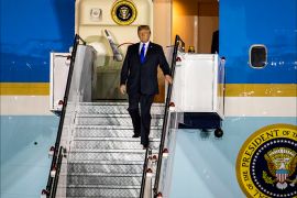 epa06798511 US President Donald J. Trump walks off Air Force One as he arrives at the Paya Lebar Air Base in Singapore, 10 June 2018. US President Donald J. Trump and North Korean leader Kim Jong-un are scheduled to meet at the Capella Hotel for a historic summit on 12 June 2018. EPA-EFE/JIM LO SCALZO