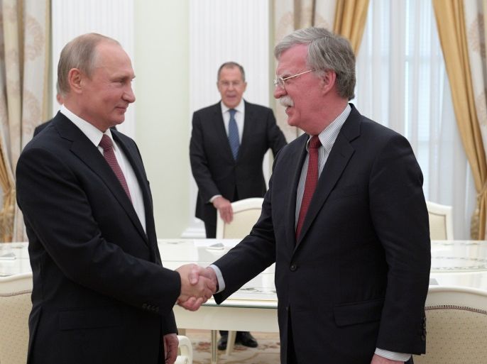 Russia's President Vladimir Putin (L) meets with U.S. National Security Adviser John Bolton in Moscow, Russia June 27, 2018. Sputnik/Alexei Druzhinin/Kremlin via REUTERS ATTENTION EDITORS - THIS IMAGE WAS PROVIDED BY A THIRD PARTY.
