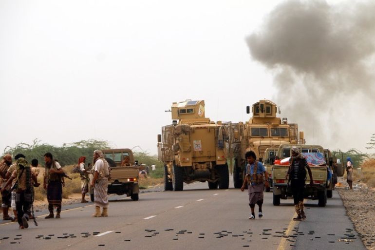 epa06805286 Yemeni forces backed by the Saudi-led coalition take position during an attack on the port city of Hodeidah, on the outskirts of Hodeidah, Yemen, 13 June 2018. According to reports, Yemeni government forces backed by the Saudi-led coalition launched a military offensive to regain control of the Red Sea port-city of Hodeidah acts as an entrance point for Houthi rebel supplies and humanitarian aid. EPA-EFE/NAJEEB ALMAHBOOB