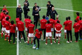 Soccer Football - World Cup - Egypt Training - Saint Petersburg Stadium, Saint Petersburg, Russia - June 18, 2018 Egypt coach Hector Cuper with their players during training REUTERS/Anton Vaganov
