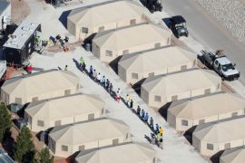 Immigrant children now housed in a tent encampment under the new