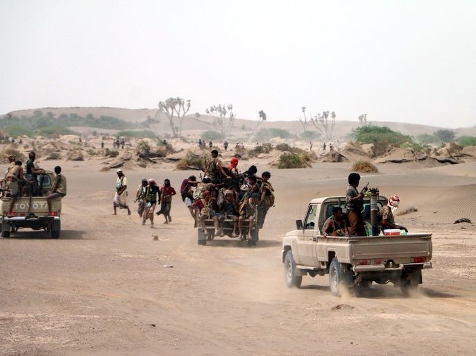 epa06847536 Yemeni government forces backed by the Saudi-led coalition take position during an attack on the port city of Hodeidah, on the outskirts of Hodeidah, Yemen, 27 June 2018 (Issued 28 June 2018). According to reports, Yemeni government forces backed by the Saudi-led coalition have made major gains south of Hodeidah during a military offensive to regain control of the Red Sea port-city that acts as an entrance point for Houthi rebel supplies and humanitarian aid