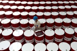 FILE PHOTO: A worker prepares to label barrels of lubricant oil at the state oil company Pertamina's lubricant production facility in Cilacap, Central Java, Indonesia November 6, 2017 in this photo taken by Antara Foto. Antara Foto/Rosa Panggabean/File Photo via REUTERS ATTENTION EDITORS - THIS IMAGE WAS PROVIDED BY A THIRD PARTY. MANDATORY CREDIT. INDONESIA OUT.