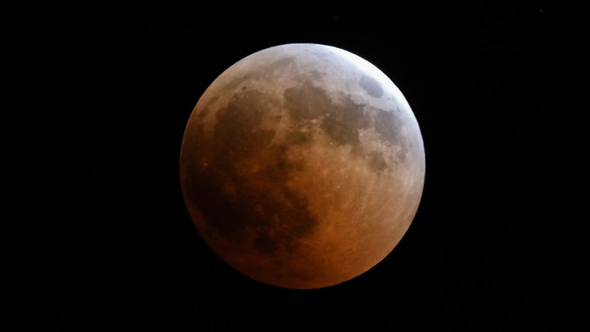 epa06914752 The moon turns red during the lunar eclipse in Loika, Magadi, 27 July 2018. The lunar eclipse on the night of 27 July 2018 is the longest total lunar eclipse of the 21st century with the event spanning for over four hours, and the total eclipse phase lasting for 103 minutes. EPA-EFE/Daniel Irungu
