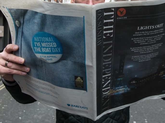 LONDON, ENGLAND - MARCH 20: A newspaper reader reads the last ever print edition of The Independent On Sunday on the street in Soho on March 20, 2016 in London, England. The newspaper was launched in 1990 with Stephen Glover as editor and is part of the group owned by the Lebedev family, who have other media assets including The Evening Standard and local TV station London Live. The closure comes with the daily edition of The Independent to be closed soon and all moved online. (Photo by Chris Ratcliffe/Getty Images)