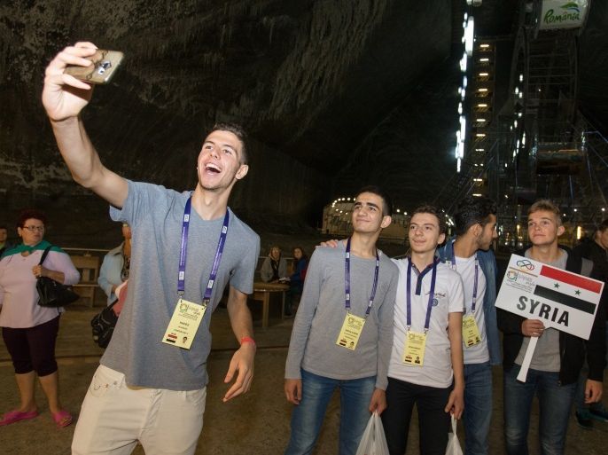 Hafez al-Assad (L), son of Syrian President Bashar al-Assad takes a selfie while visiting Turda Salt Mine as he attends the 59th International Mathematical Olympiad, in Turda city, Romania, 11 July 2018. Hafez al-Assad is one of the 615 students participating at the competition in Cluj-Napoca from 03 to 14 July. The International Mathematical Olympiad (IMO) is the World Championship Mathematics Competition for High School students and is held annually in a different country. The first IMO was held in 1959 in Romania, with seven countries participating. EPA-EFE/MIRCEA ROSCA