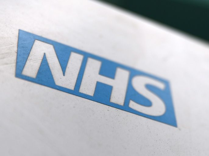 An NHS logo is displayed outside a hospital in London, Britain May 14, 2017. REUTERS/Neil Hall