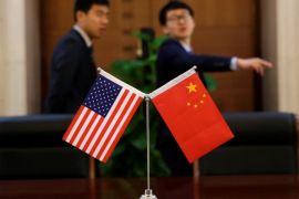 Chinese and U.S. flags are set up for a signing ceremony during a visit by U.S. Secretary of Transportation Elaine Chao at China's Ministry of Transport in Beijing, China April 27, 2018. Picture taken April 27, 2018. REUTERS/Jason Lee