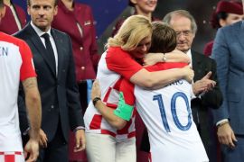 MOSCOW, RUSSIA - JULY 15: President of Croatia, Kolinda Grabar Kitarovic greets Luka Modric of Croatia as he is presented with his runners-up medal after the 2018 FIFA World Cup Final between France and Croatia at Luzhniki Stadium on July 15, 2018 in Moscow, Russia. (Photo by Clive Rose/Getty Images)