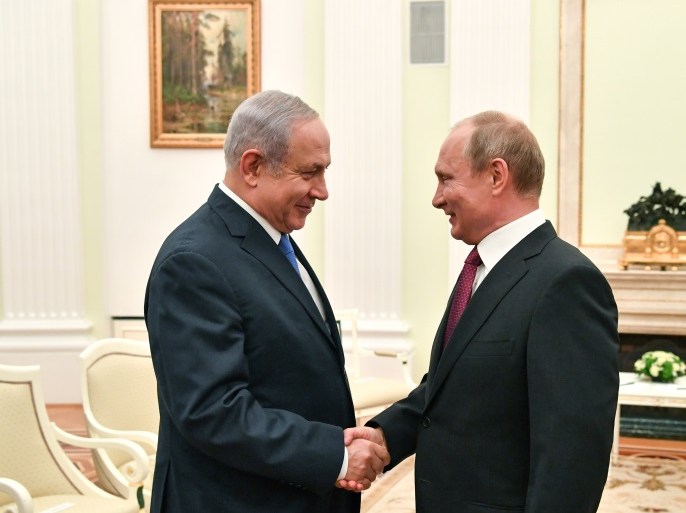 Russian President Vladimir Putin shakes hands with Israeli Prime Minister Benjamin Netanyahu during their meeting at the Kremlin in Moscow, Russia July 11, 2018. Yuri Kadobnov/Pool via REUTERS