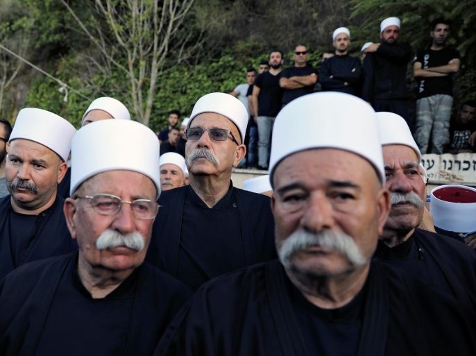 Members of the Druze community attend the funeral of Druze police officer Kamil Shanan at the northern village of Hurfeish, Israel July 14 2017 REUTERS/Ammar Awad