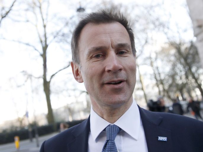 Britain's Secretary of State for Health Jeremy Hunt leaves Millbank studios in London, Britain February 11, 2016. The British government said on Thursday it would force through pay and working condition reforms for English doctors without the agreement of their trade union in a push to end a dispute that has resulted in strikes. Health Secretary Jeremy Hunt made the announcement shortly after the second in a series of 24-hour strikes, the like of which had not been seen in Britain for 40 years. During the strikes, junior doctors, or doctors-in-training, provided only emergency care. REUTERS/Neil Hall