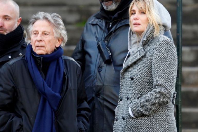 Film director Roman Polanski and Emmanuelle Seigner arrive at the Madeleine Church to attend a ceremony during a 'popular tribute' to late French singer and actor Johnny Hallyday in Paris, France, December 9, 2017. REUTERS/Charles Platiau
