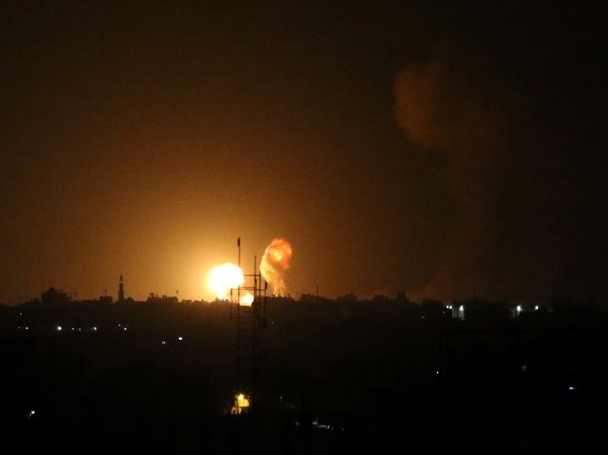 An explosion is seen following an Israeli air strike in the southern Gaza Strip July 20, 2018. REUTERS/Ibraheem Abu Mustafa