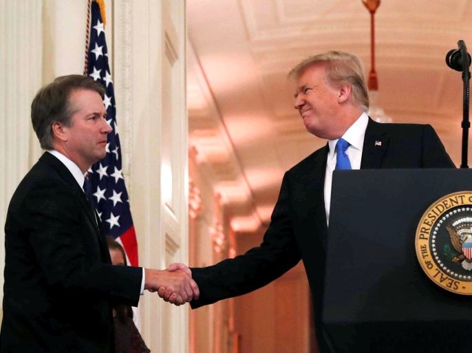 U.S. President Donald Trump introduces his Supreme Court nominee judge Brett Kavanaugh (L) in the East Room of the White House in Washington, U.S., July 9, 2018. REUTERS/Leah Millis TPX IMAGES OF THE DAY