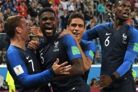 SAINT PETERSBURG, RUSSIA - JULY 10: Samuel Umtiti of France celebrates with team mates after scoring his team's first goal during the 2018 FIFA World Cup Russia Semi Final match between Belgium and France at Saint Petersburg Stadium on July 10, 2018 in Saint Petersburg, Russia. (Photo by Shaun Botterill/Getty Images)