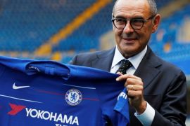 Soccer Football - Premier League - Chelsea present new manager Maurizio Sarri - Stamford Bridge, London, Britain - July 18, 2018 New Chelsea manager Maurizio Sarri poses with the club shirt after the press conference Action Images via Reuters/John Sibley