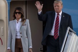 HELSINKI, FINLAND - JULY 15: U.S. President Donald Trump and first lady, Melania Trump arrive aboard Air Force One at Helsinki International Airport on July 15, 2018 in Helsinki, Finland. President Trump arrived in Helsinki for talks with Russian President Vladimir Putin. Trump said in a recent statement that he has ' low expectations' for the meeting, however he is under increasing pressure to confront the Russian President directly about special counsel Robert Mueller's indictment of twelve Russians said to have conspired to sway the decision of the 2016 US election. (Photo by Chris McGrath/Getty Images)