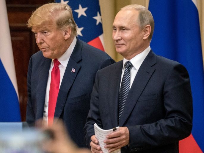 HELSINKI, FINLAND - JULY 16: U.S. President Donald Trump (L) and Russian President Vladimir Putin arrive to waiting media during a joint press conference after their summit on July 16, 2018 in Helsinki, Finland. The two leaders met one-on-one and discussed a range of issues including the 2016 U.S Election collusion. (Photo by Chris McGrath/Getty Images)