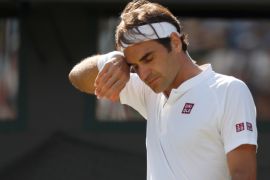 Tennis - Wimbledon - All England Lawn Tennis and Croquet Club, London, Britain - July 11, 2018. Switzerland's Roger Federer reacts during his quarter final match against South Africa's Kevin Anderson . REUTERS/Andrew Boyers