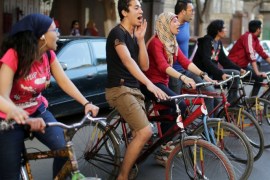 Protesters from ''6th of April'' group and other opposition activists chant slogans on bicycles as they take part in what they dub a