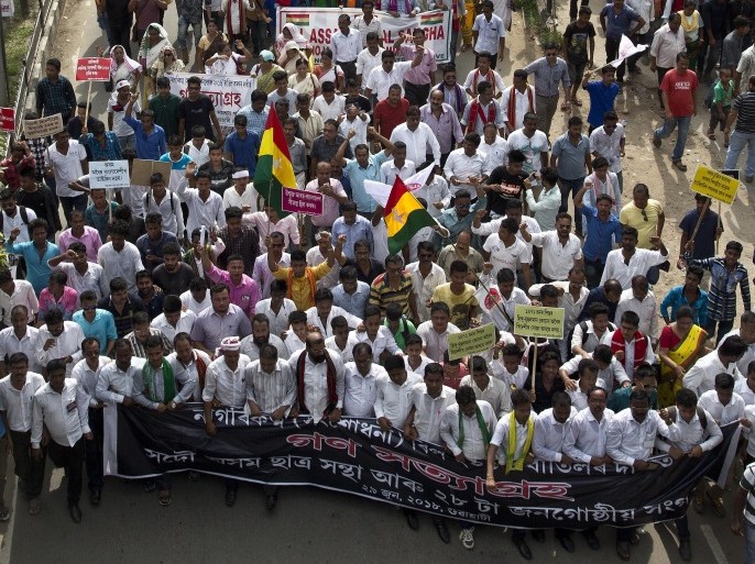 epa06849751 Activists of All Assam Students' Union (AASU), along with 28 other organizations walk during a protest rally against India's Citizenship Amendment Bill 2016 in Guwahati, Assam, India, 29 June 2018. Hundreds of people protesting against a bill by the Indian government that provide citizenship to illegal migrants from Afghanistan, Bangladesh, and Pakistan, who are of Hindu, Sikh, Buddhist, Jain, Parsi, or Christian but doesn’t have a provision for Muslim sec