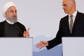Swiss President Alain Berset and Iranian President Hassan Rouhani gesture after they deliver a statement after a two day visit in Bern, Switzerland, July 3, 2018. REUTERS/Denis Balibouse