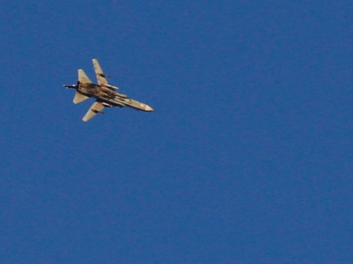 A war jet flies above Syria near the Israeli Syrian border as it is seen from the Israeli-occupied Golan Heights, Israel July 23, 2018. REUTERS/Ronen Zvulun
