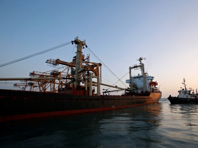 A ship carrying 5,500 tonnes of flour is towed by a tugboat at the Red Sea port of Hodeidah, Yemen November 26, 2017. Picture taken November 26, 2017. REUTERS/Abduljabbar Zeyad
