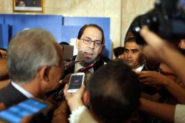 epa05453080 Tunisia's newly appointed prime minister Youssef Chahed speaks to media after being appointed by the Tunisian president at Carthage Palace in Carthage, Tunis,Tunisia, 03 August 2016. EPA/MOHAMED MESSARA