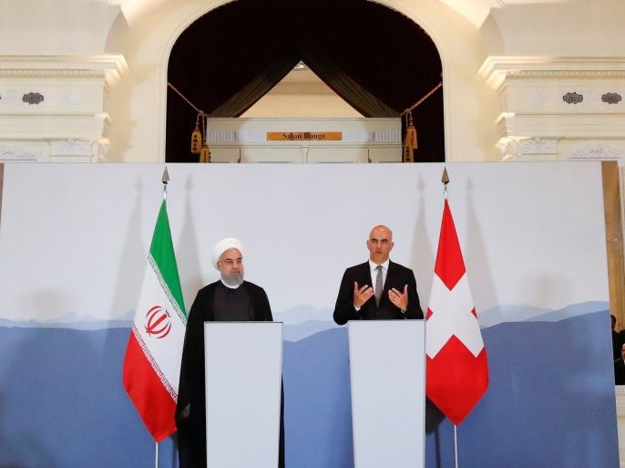 Swiss President Alain Berset and Iranian President Hassan Rouhani deliver a statement after a two day visit in Bern, Switzerland, July 3, 2018. REUTERS/Denis Balibouse